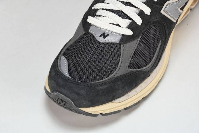 NEW BALANCE Q26 New Balance M2002RHO