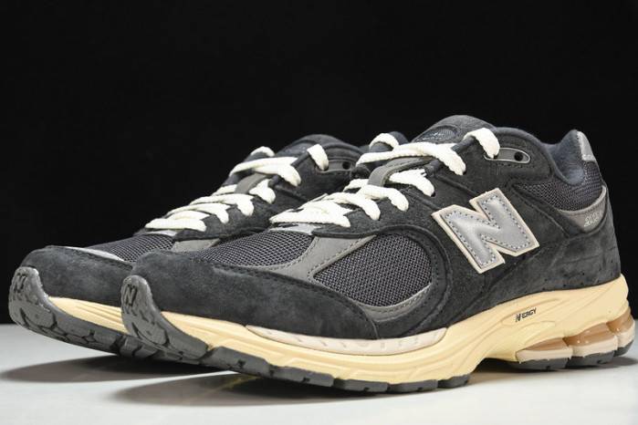 NEW BALANCE Q26 New Balance M2002RHO